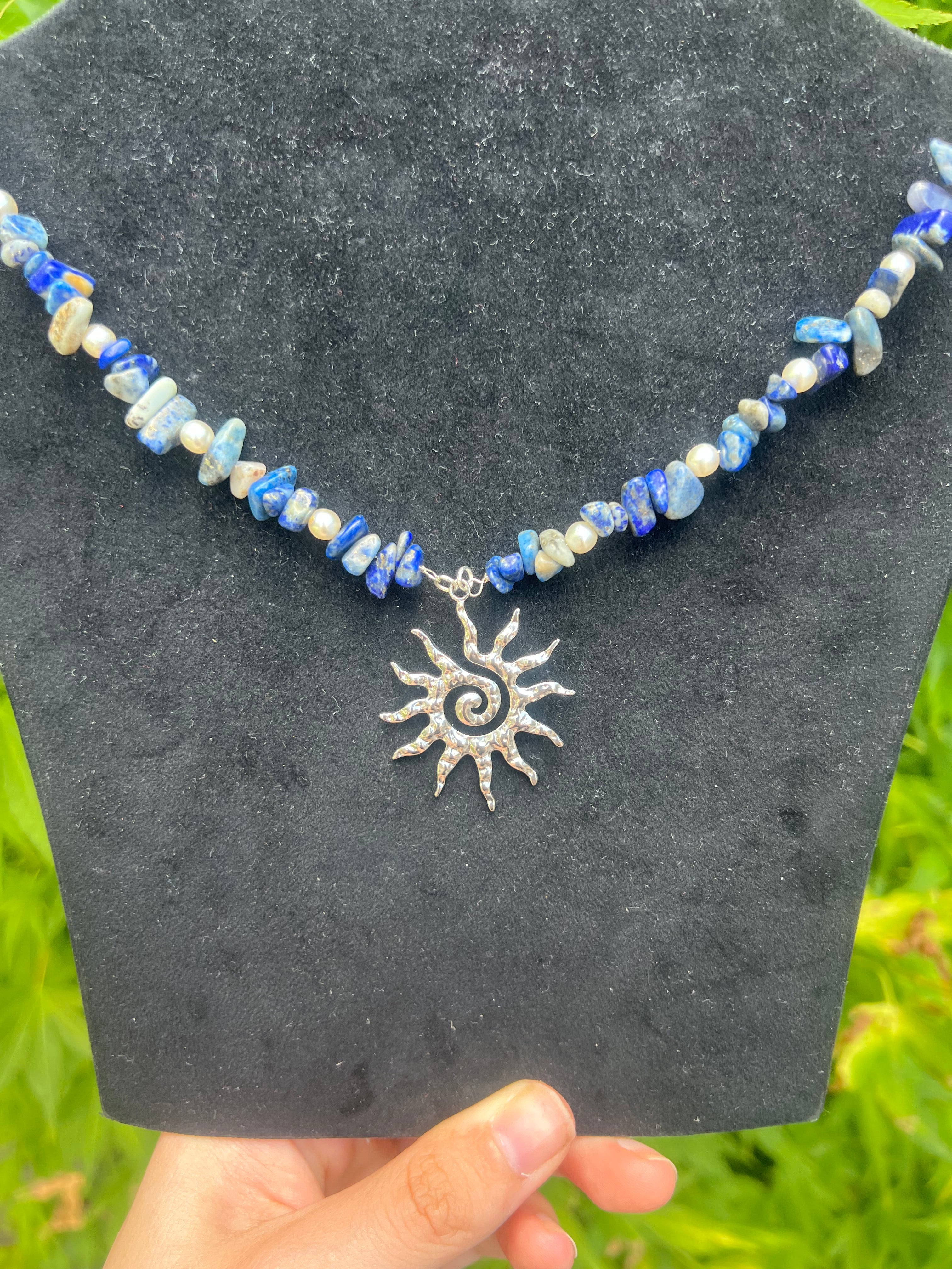 A sun’s tide necklace