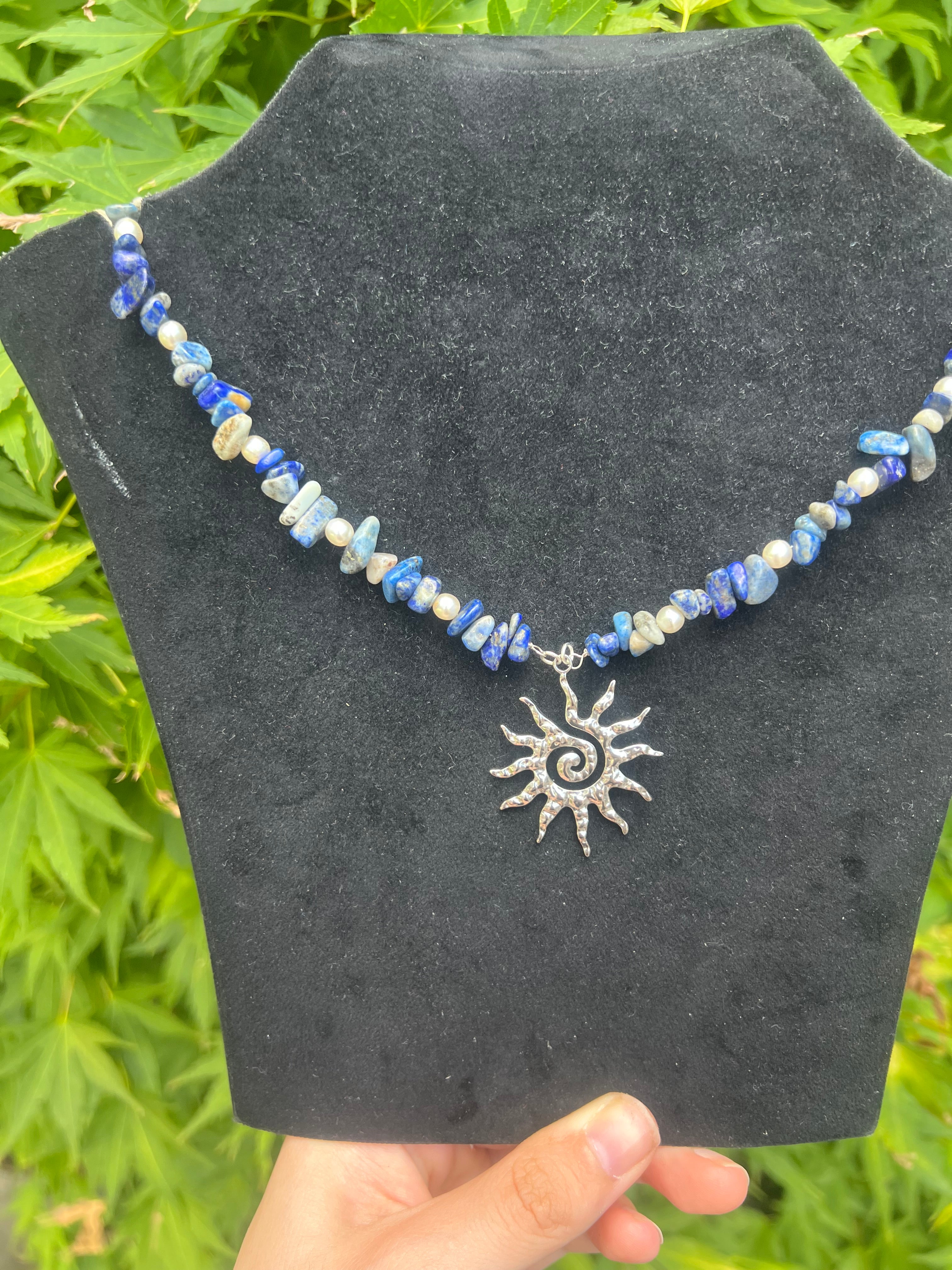 A sun’s tide necklace