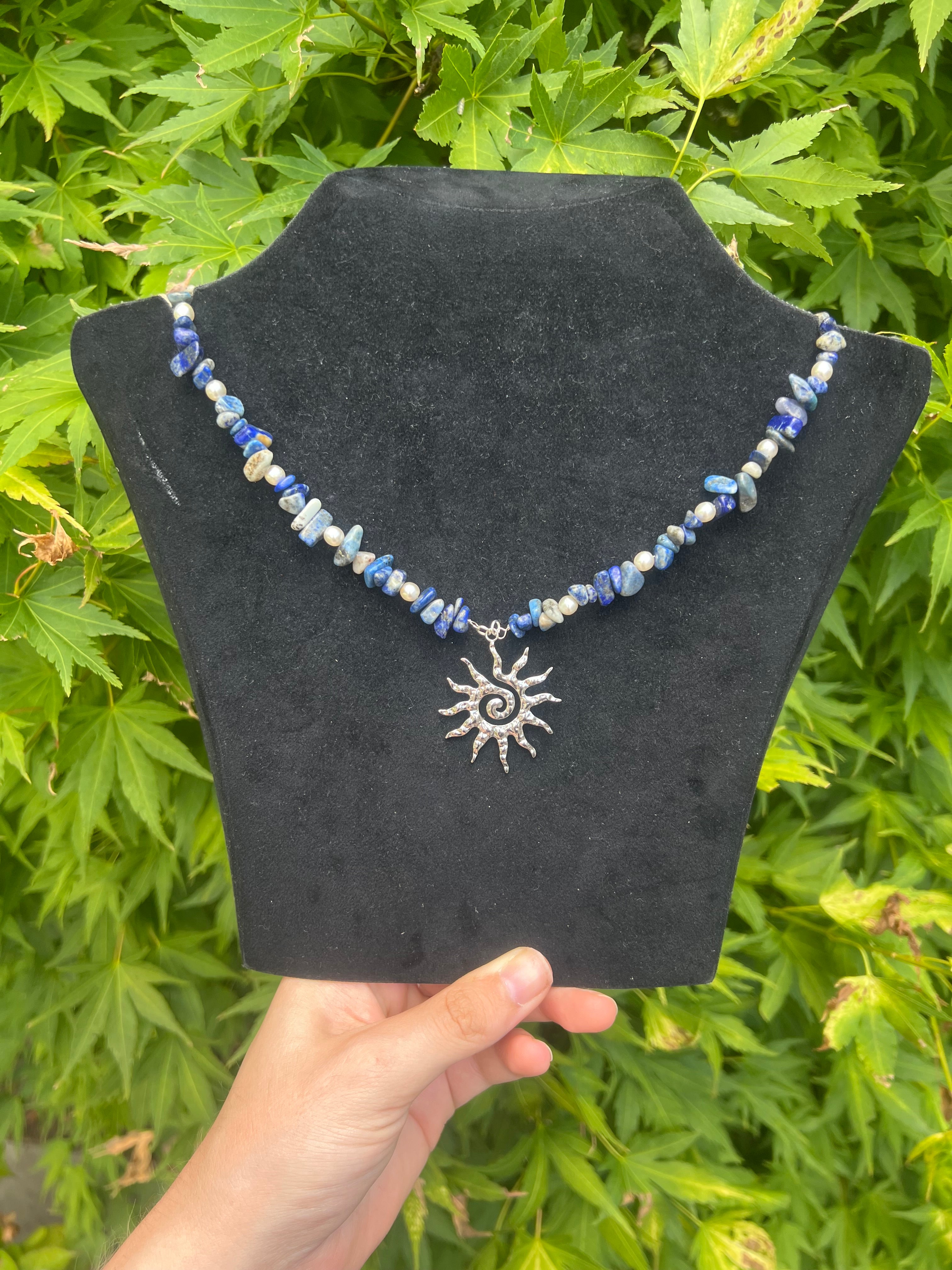 A sun’s tide necklace