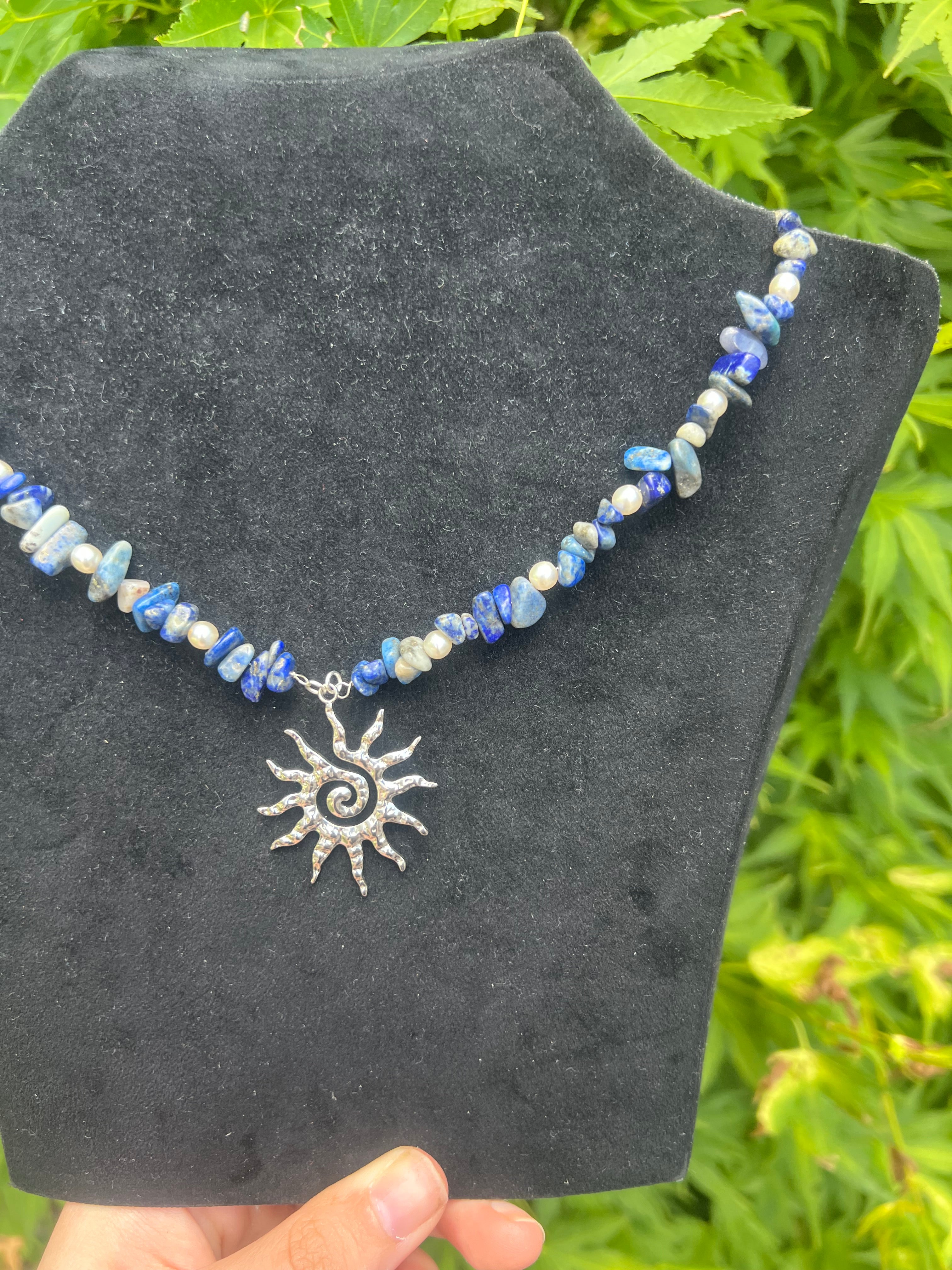 A sun’s tide necklace